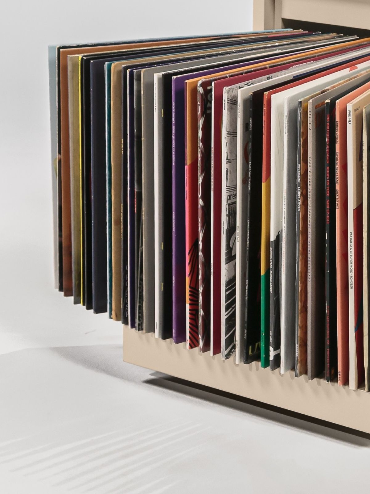 The Bloom Kit's grey felt sleeves fanned open full of records, seen at a three-quarter angle — Groovaly