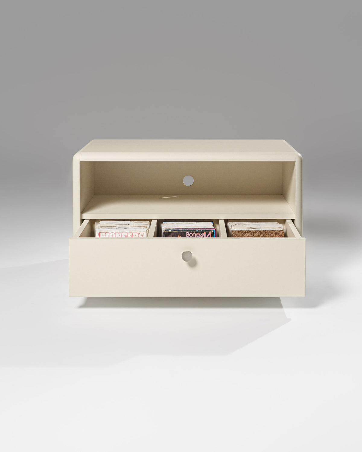 Chest module in White Pearl, front view, drawer open with 7-inch singles in three compartments — Groovaly