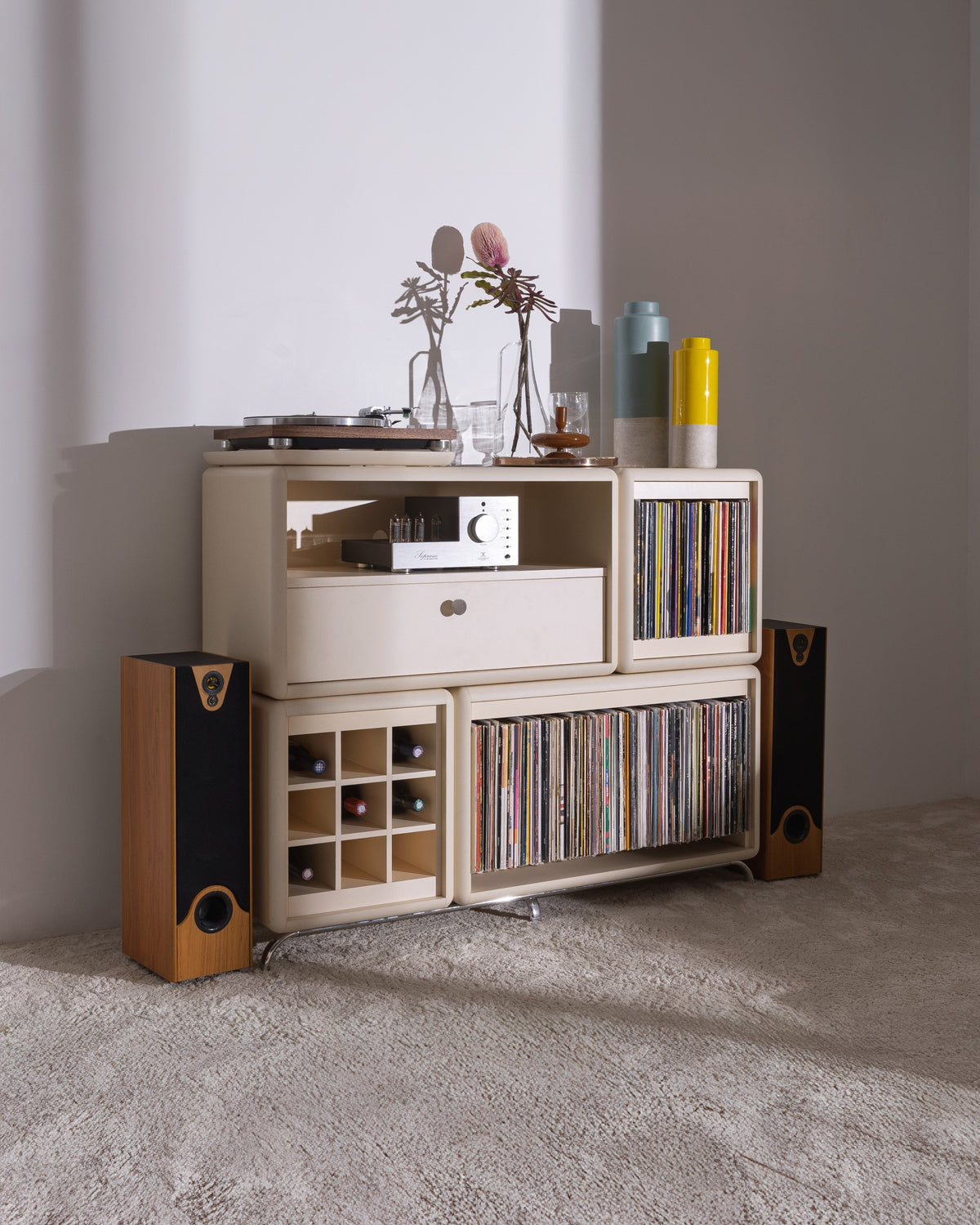 Curtis vinyl furniture in White Pearl, a five-module composition with turntable on top, in a living room — Groovaly