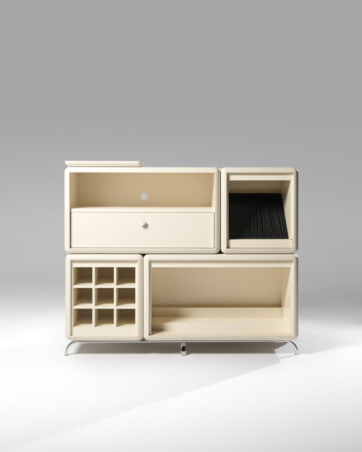 Curtis vinyl furniture in White Pearl, front studio view of the five-module composition — Groovaly