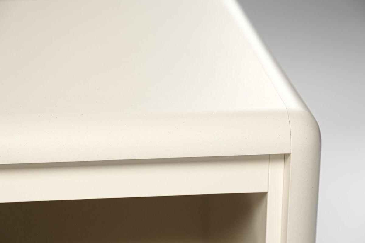 Close detail of a rounded corner in matt White Pearl Valchromat — Groovaly
