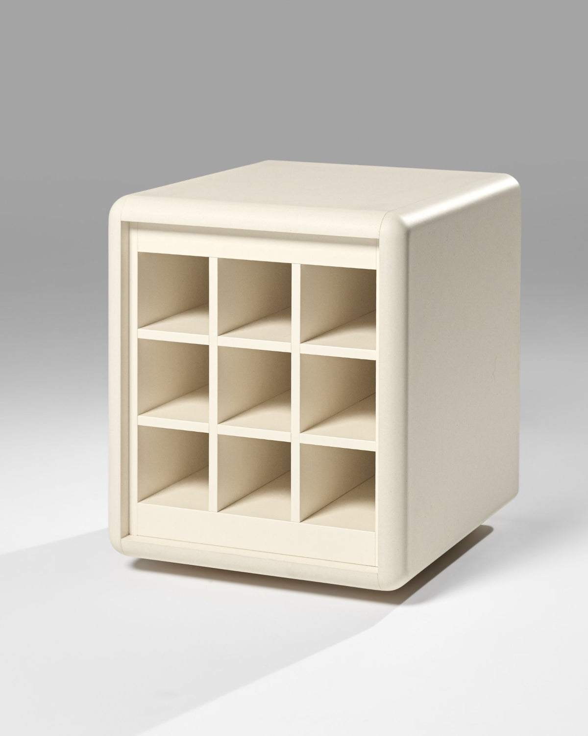 Grid wine module in White Pearl, three-quarter view, showing the nine bottle compartments — Groovaly