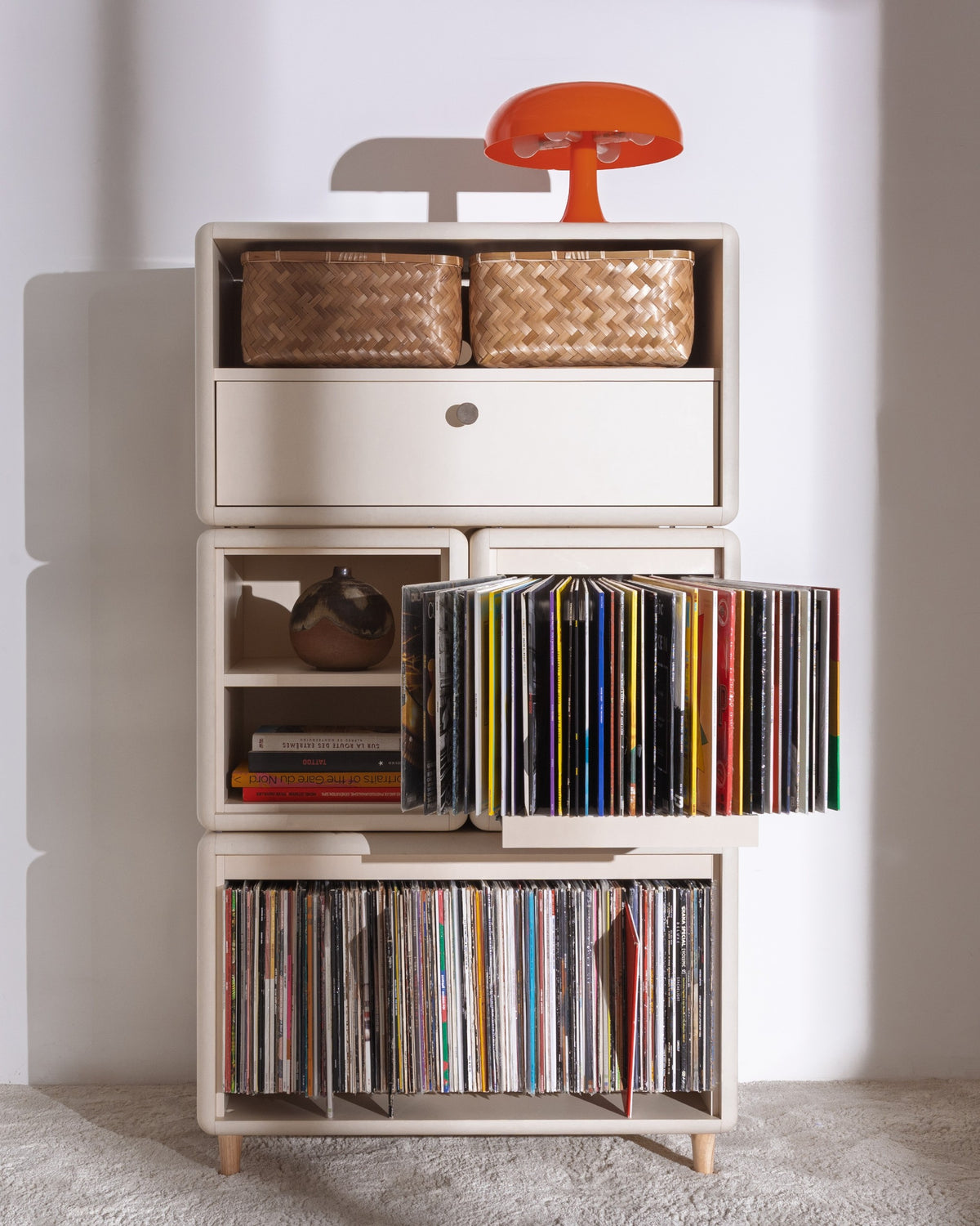 James in White Pearl, records fanned open in the Bloom drawer, styled full with a lamp on top — Groovaly