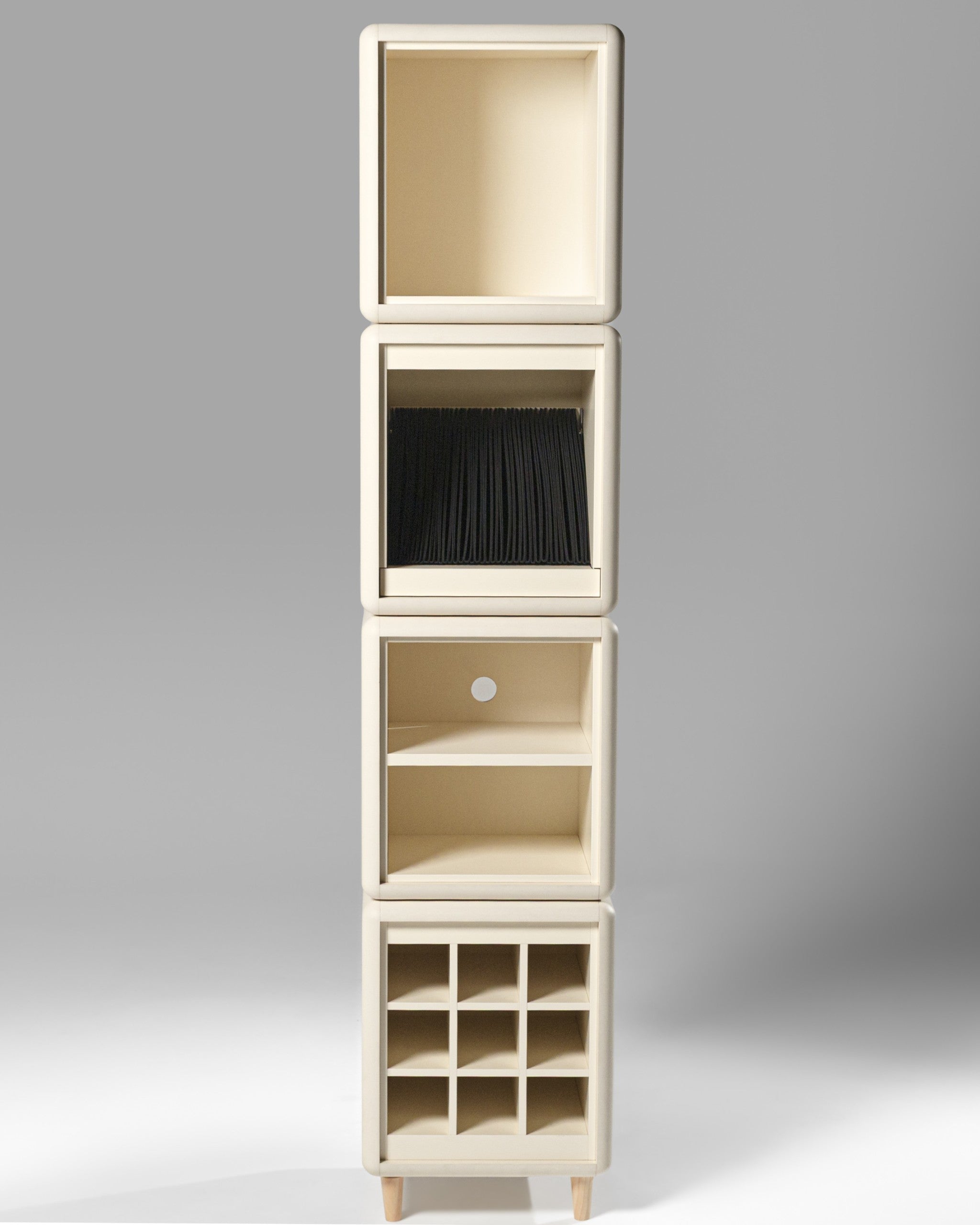 Lou in White Pearl from the front, a four-module tower with black sleeves in the Bloom drawer — Groovaly