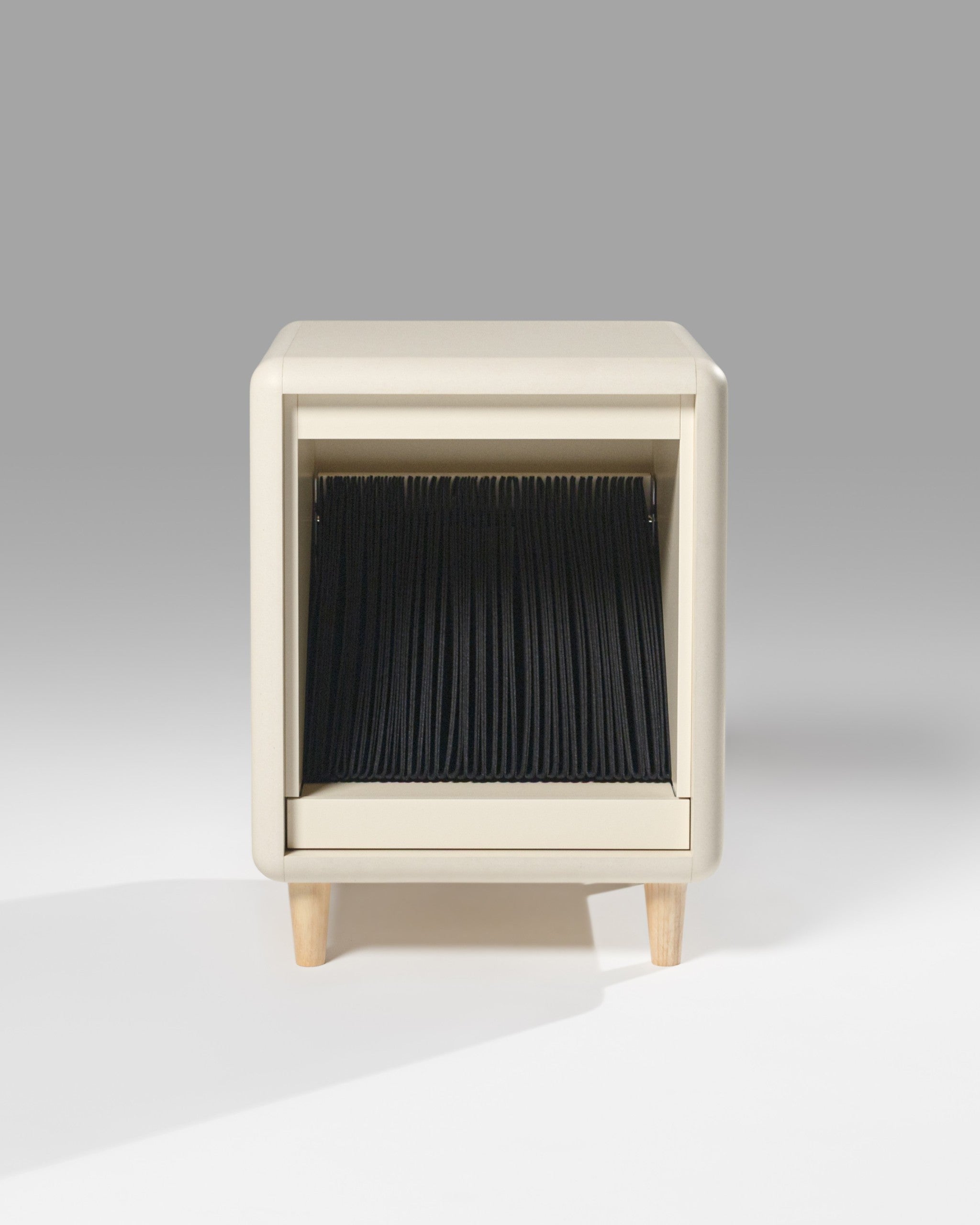 Otis vinyl furniture in White Pearl, front view, showing the empty felt sleeves inside — Groovaly