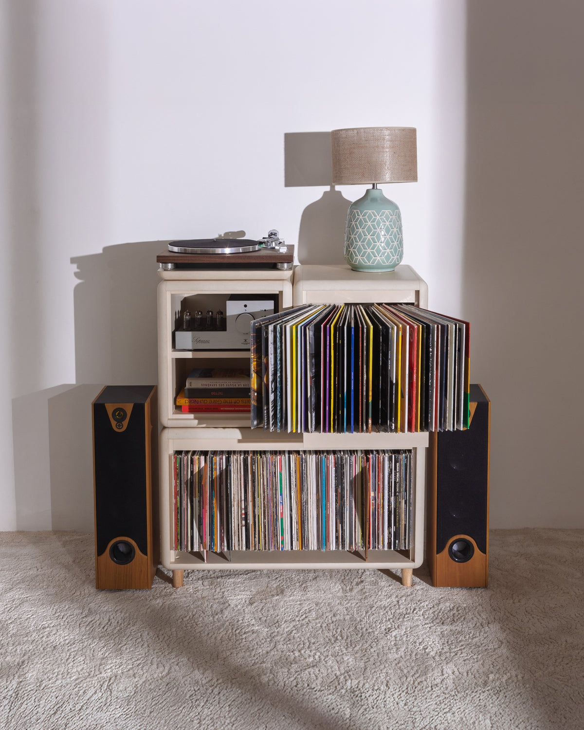 Patti in White Pearl, records fanned open in the Bloom drawer, styled with objects and a lamp on top — Groovaly