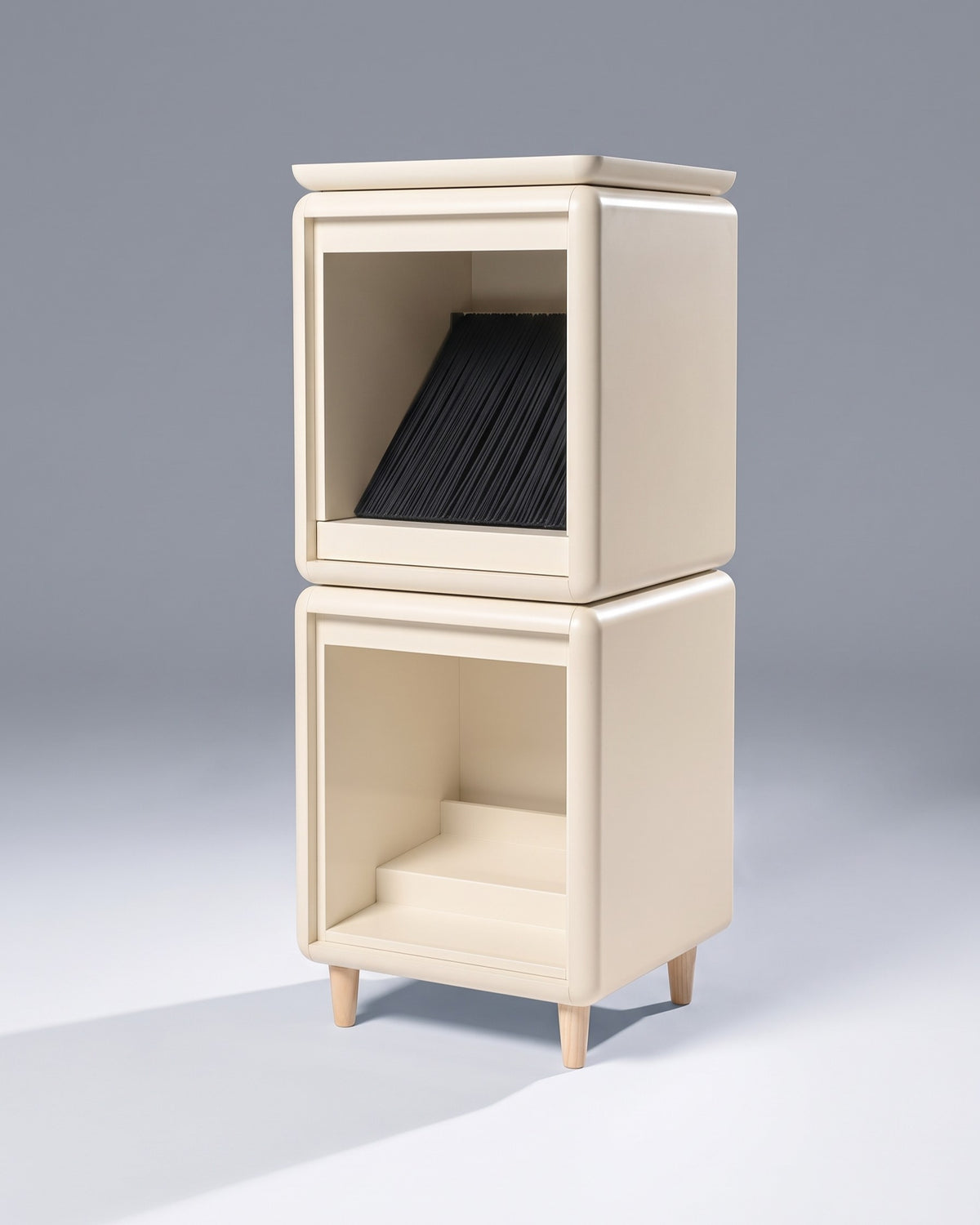 Sly vinyl furniture on feet, studio view: the Bloom fan-drawer's black felt sleeves above the Lean module's raised rear base — Groovaly