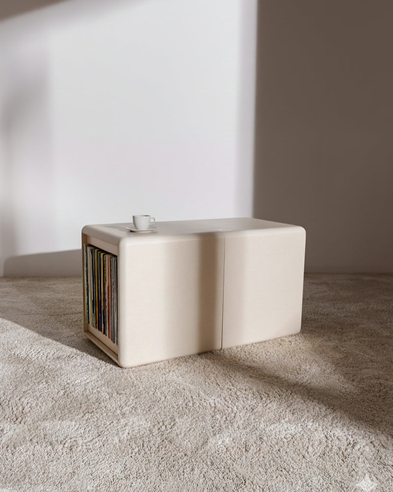 Tina in White Pearl on the floor, the closed Bloom drawer holding records beside the Grid — Groovaly