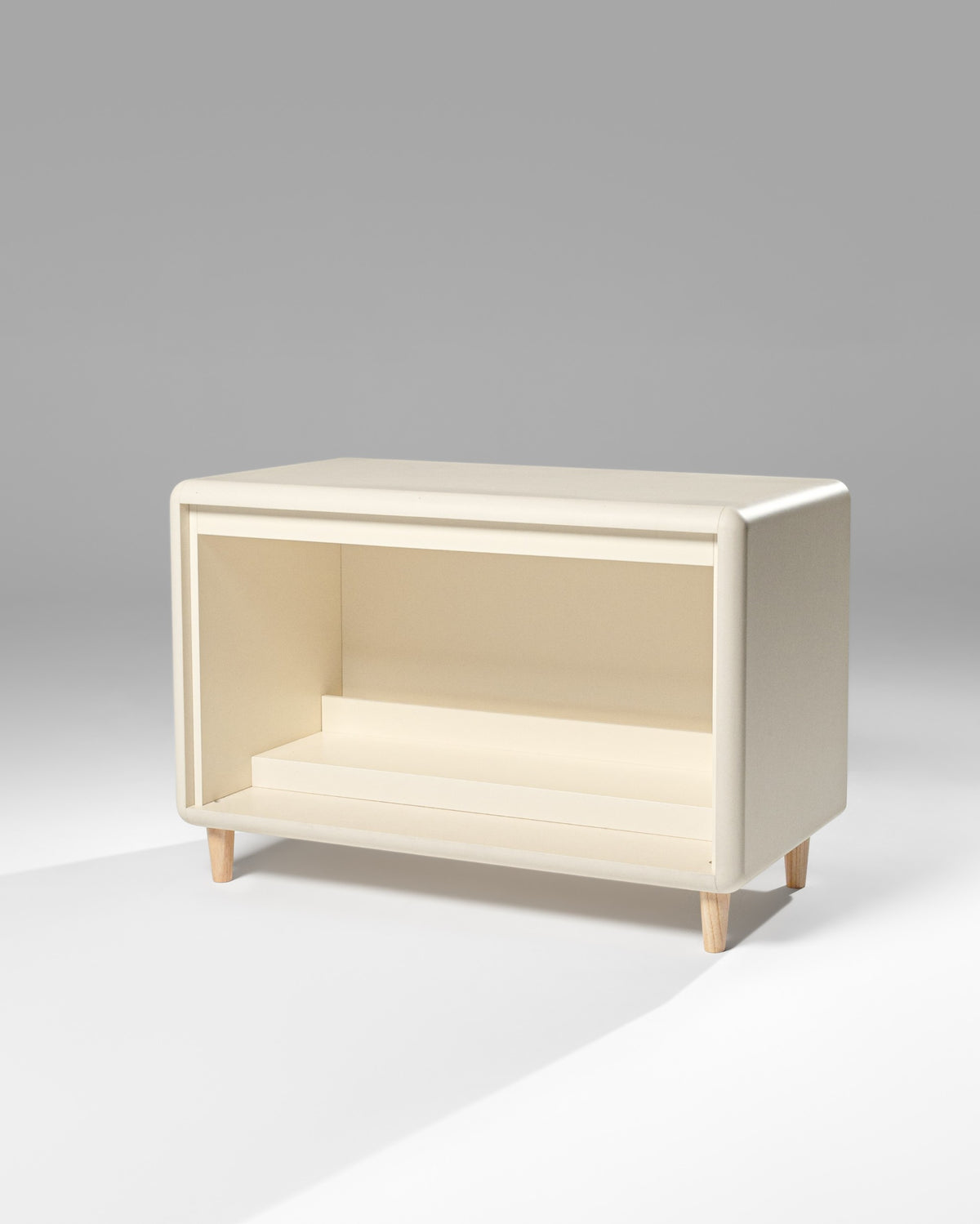 Empty Alton in White Pearl at an angle, a single Tilt module on feet, open bay in view — Groovaly