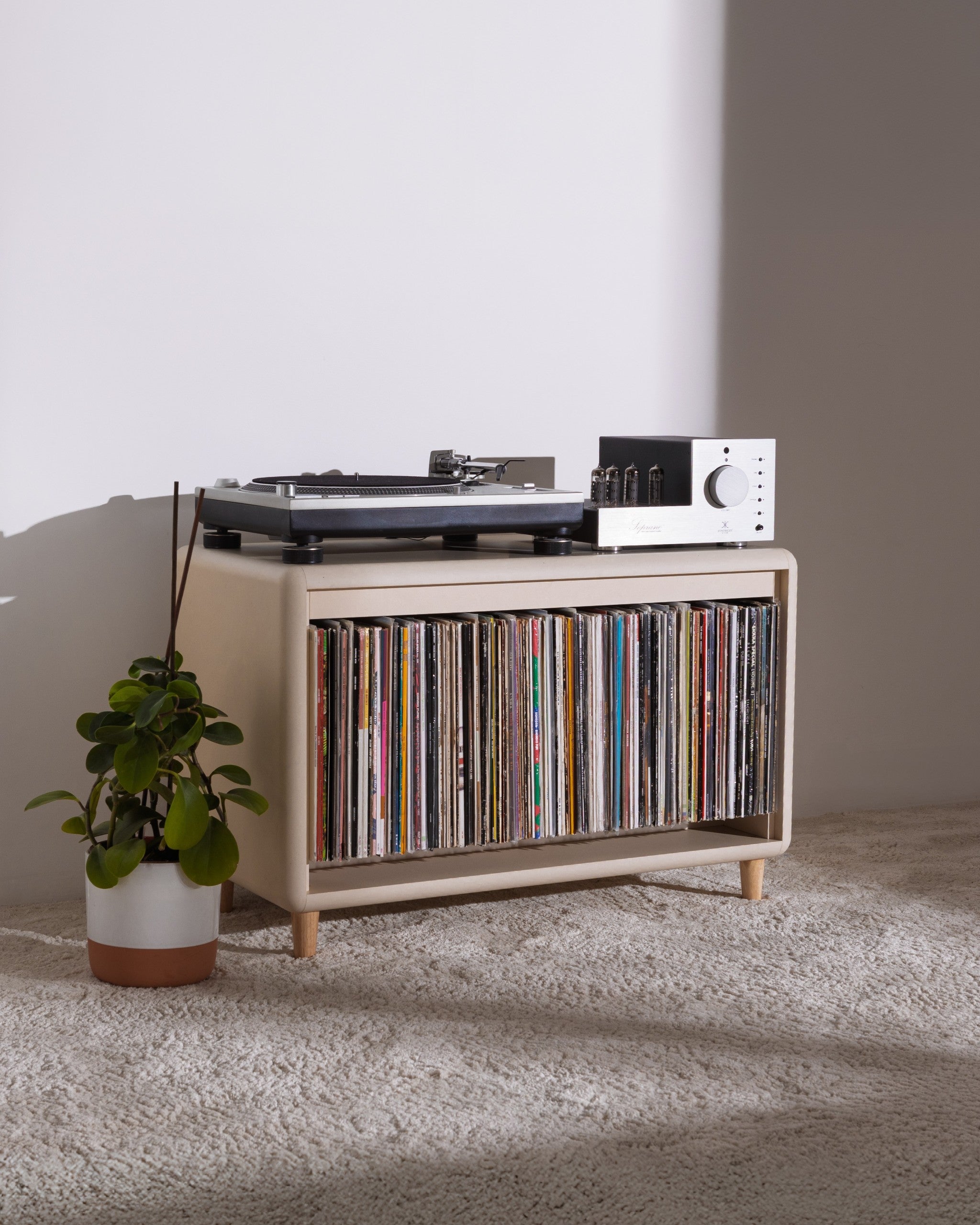 Alton in White Pearl: a Tilt module on feet, records inside with a turntable and amp on top — Groovaly