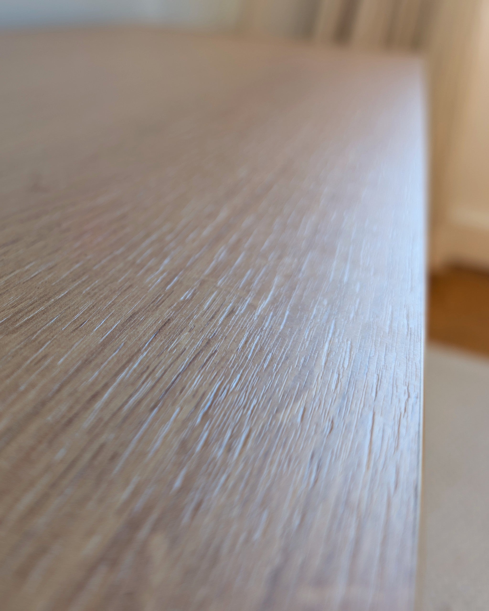 Close detail of the Corbridge oak finish on Bloom Console — soft matt with an open, natural grain — Groovaly