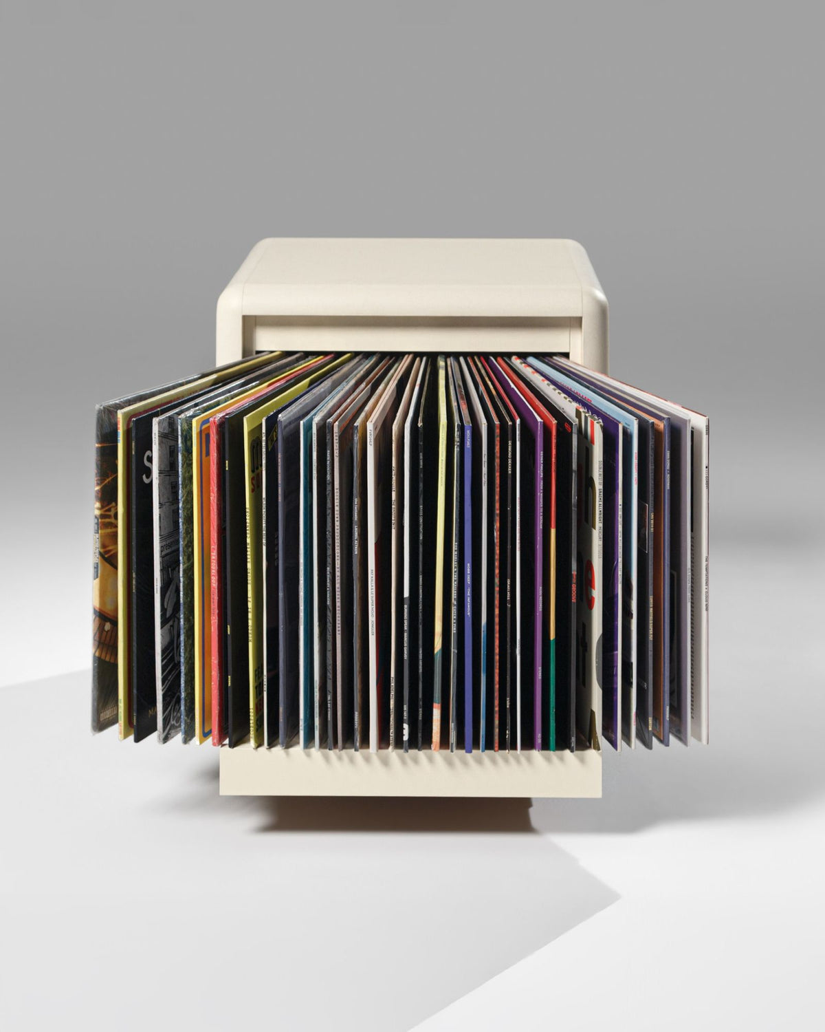 Bloom vinyl module in White Pearl, front view, drawer open, records fanned out to show their covers — Groovaly