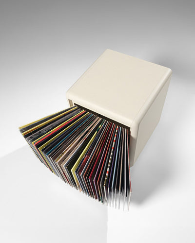 Bloom vinyl module in White Pearl seen from above, drawer open with records fanned into an arc — Groovaly