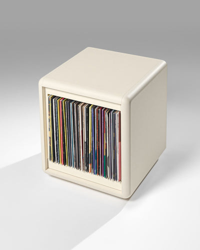Bloom vinyl module in White Pearl, three-quarter view, filled with records, drawer closed — Groovaly