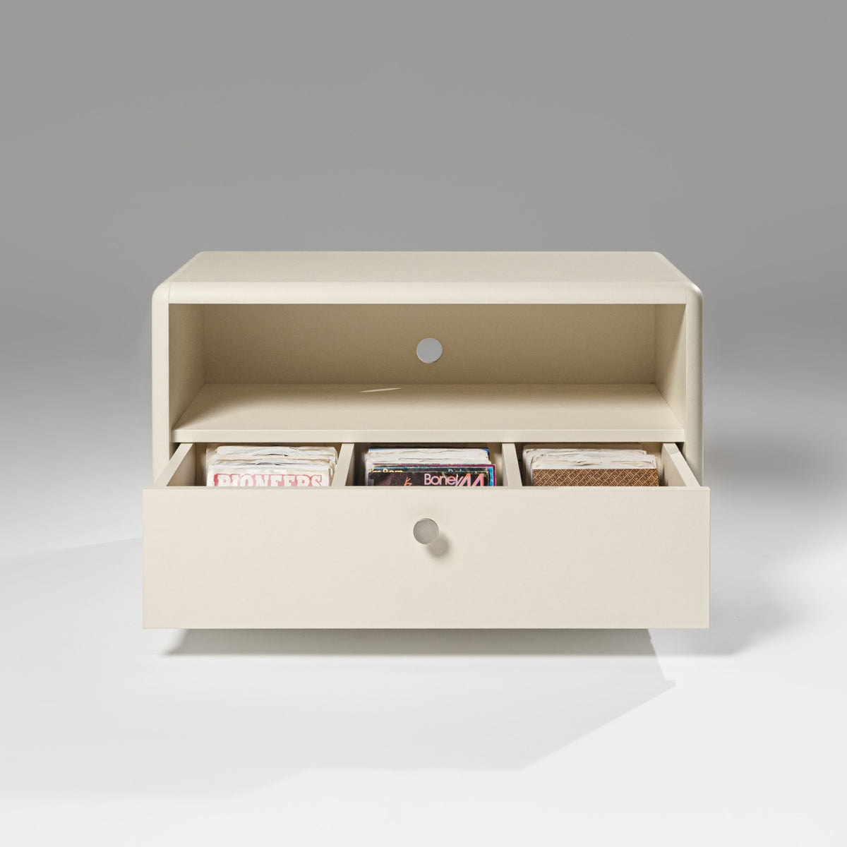 The Chest module in White Pearl, drawer open on three compartments below an open shelf — Groovaly