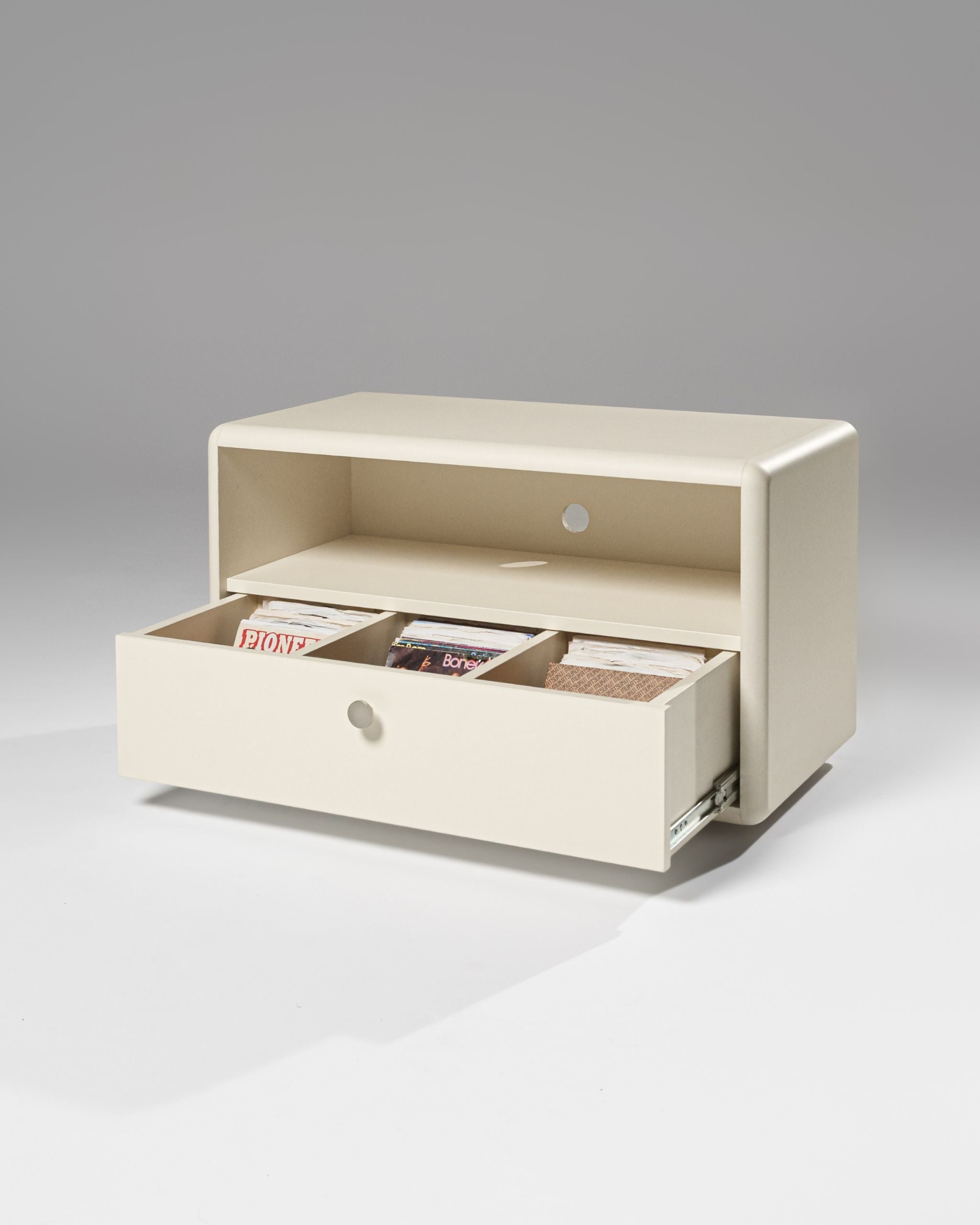 Chest module in White Pearl, drawer open showing 7-inch singles in three compartments, with an open shelf above — Groovaly