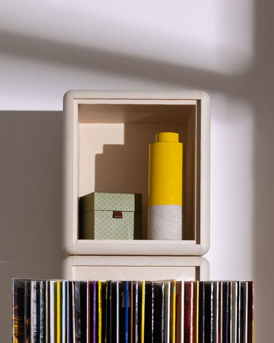 Cub module in White Pearl holding objects, stacked on a Bloom module with its fan-drawer open — Groovaly