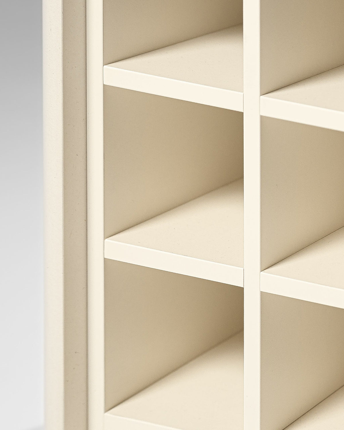 Close-up of the nine bottle compartments of the Grid module in White Pearl — Groovaly