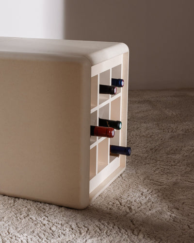 Grid wine module in White Pearl on the floor, bottles resting in the compartments with their necks out — Groovaly
