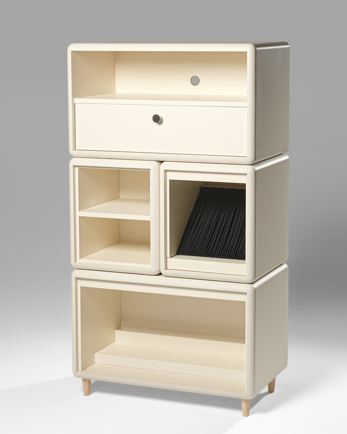 James in White Pearl shown empty in studio on feet, its four modules stacked above a Tilt base — Groovaly
