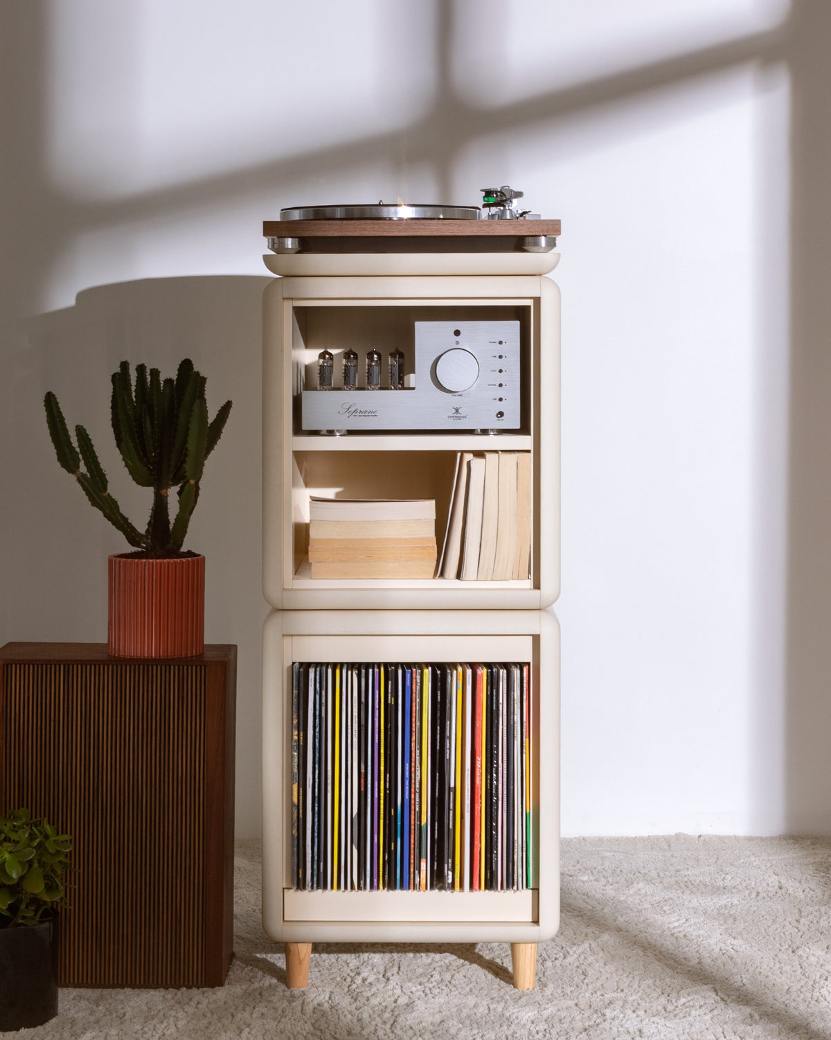 Janis in White Pearl in a room, turntable on the Nest platform above the closed Bloom drawer with records inside — Groovaly