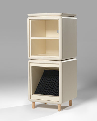 Janis in White Pearl at an angle on feet, the Split's open bays above the closed Bloom drawer — Groovaly