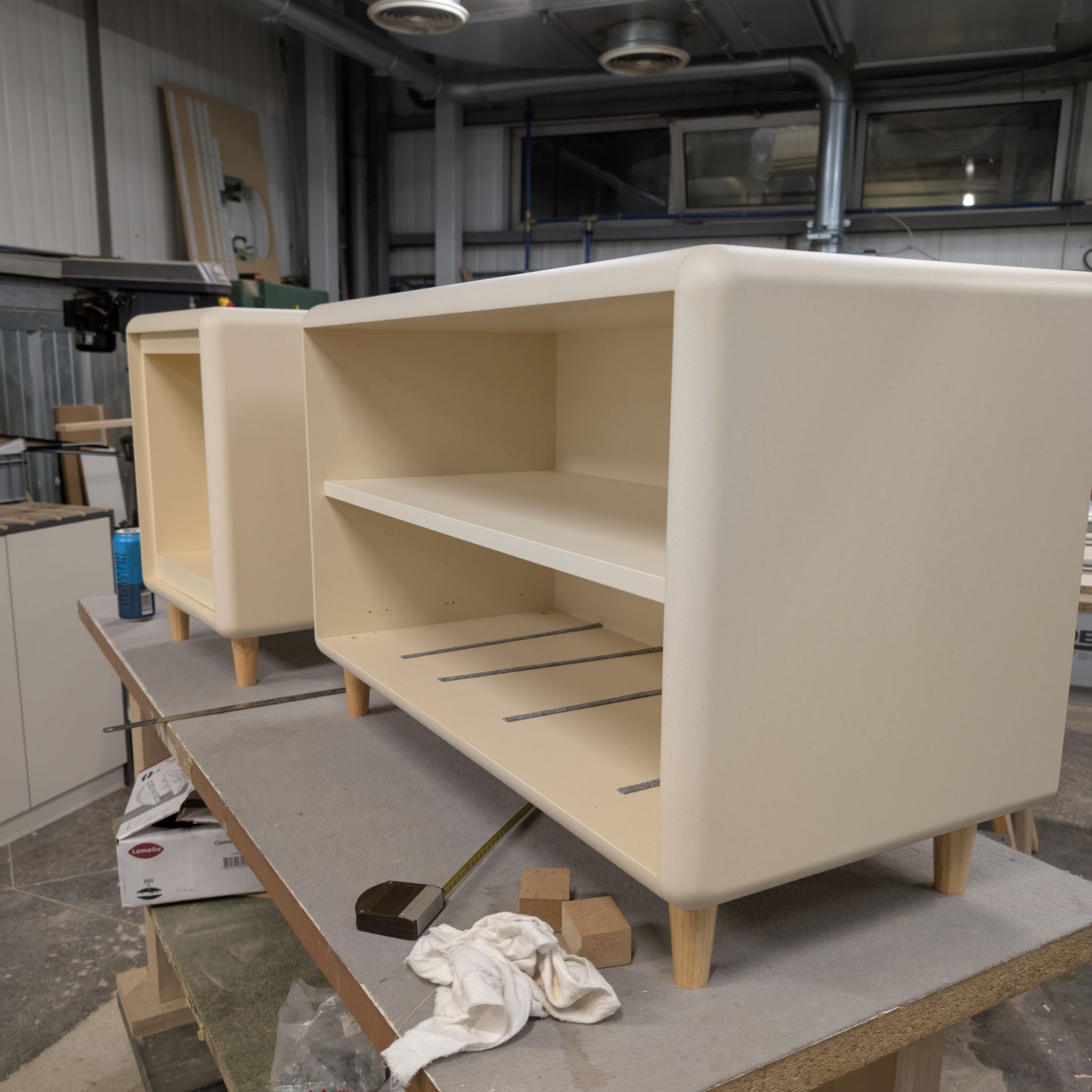 Two finished Golden Age modules on the workbench, on their wooden feet — Groovaly