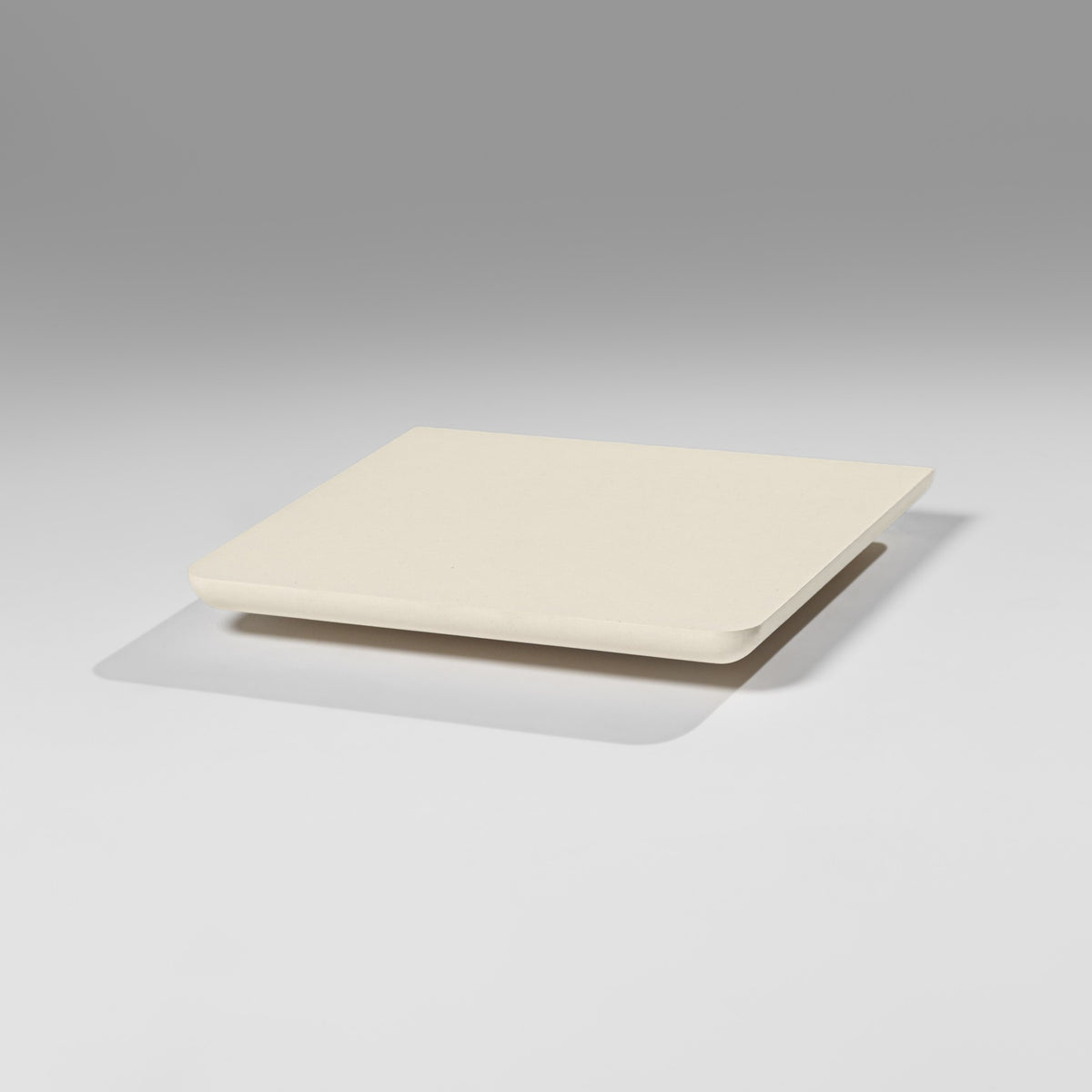 The Nest module in White Pearl, a slim turntable platform seen at an angle — Groovaly