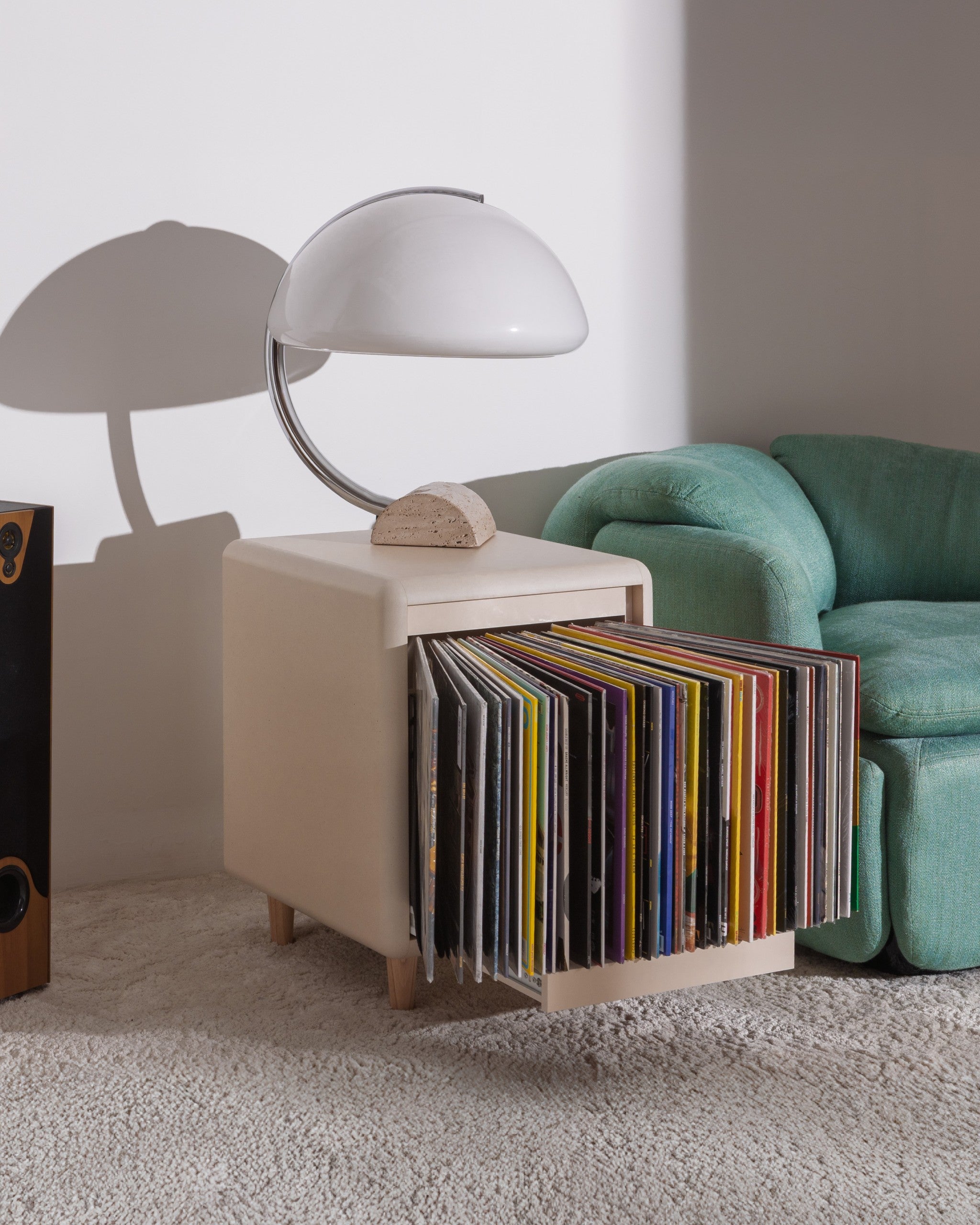 Otis vinyl furniture in White Pearl, Bloom fan-drawer open with records, in a living room — Groovaly