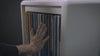 A Bloom fan-drawer opening, record covers fanning open into an arc to reveal them all at once — Groovaly.