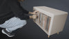 Browsing a Tilt module — a sleeve tipped forward to read its cover, then eased back and realigned, one by one — Groovaly.