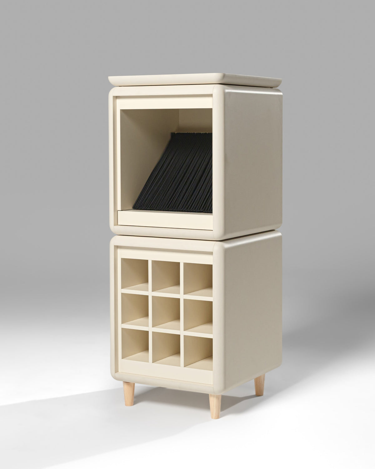 Sly in White Pearl shown empty in studio on feet, the Bloom drawer above a bottle Grid — Groovaly