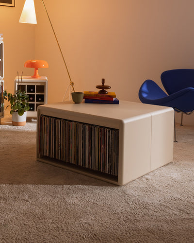 Thelonious vinyl furniture in White Pearl used as a low table, records on the Tilt side, books and objects on top — Groovaly