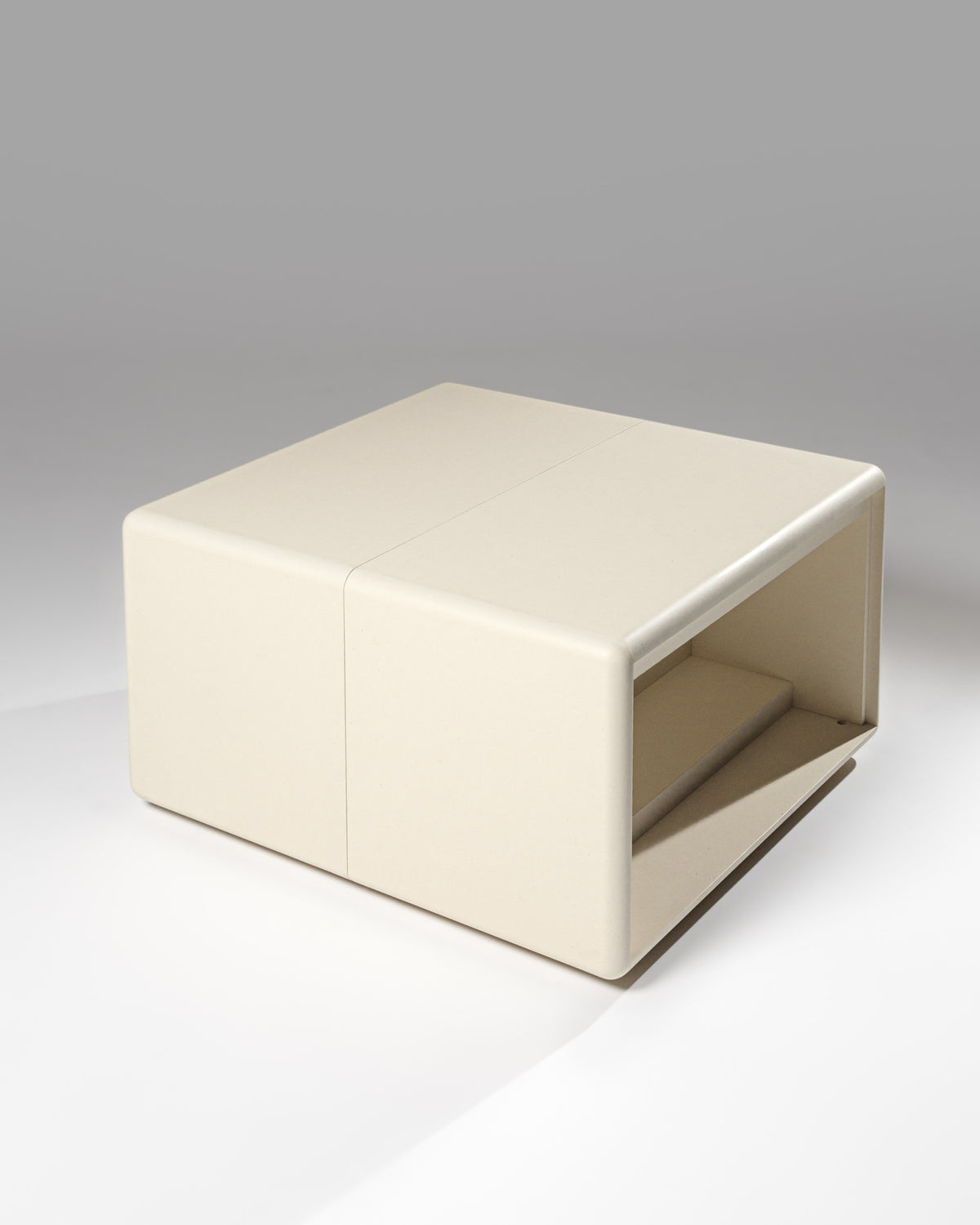 Thelonious vinyl furniture in White Pearl, the Tilt side empty, back-to-back with the Chest — Groovaly