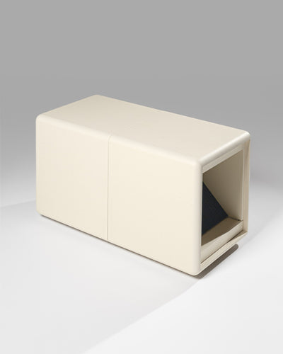 Tina in White Pearl shown empty in studio, a low Bloom-and-Grid pair set on the floor — Groovaly